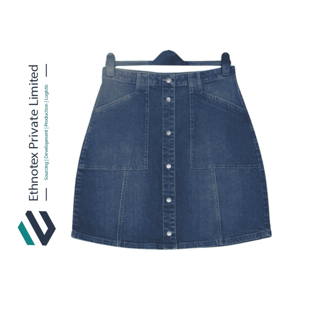 A medium-wash denim skirt with a front button closure and two large patch pockets, displayed on a hanger.