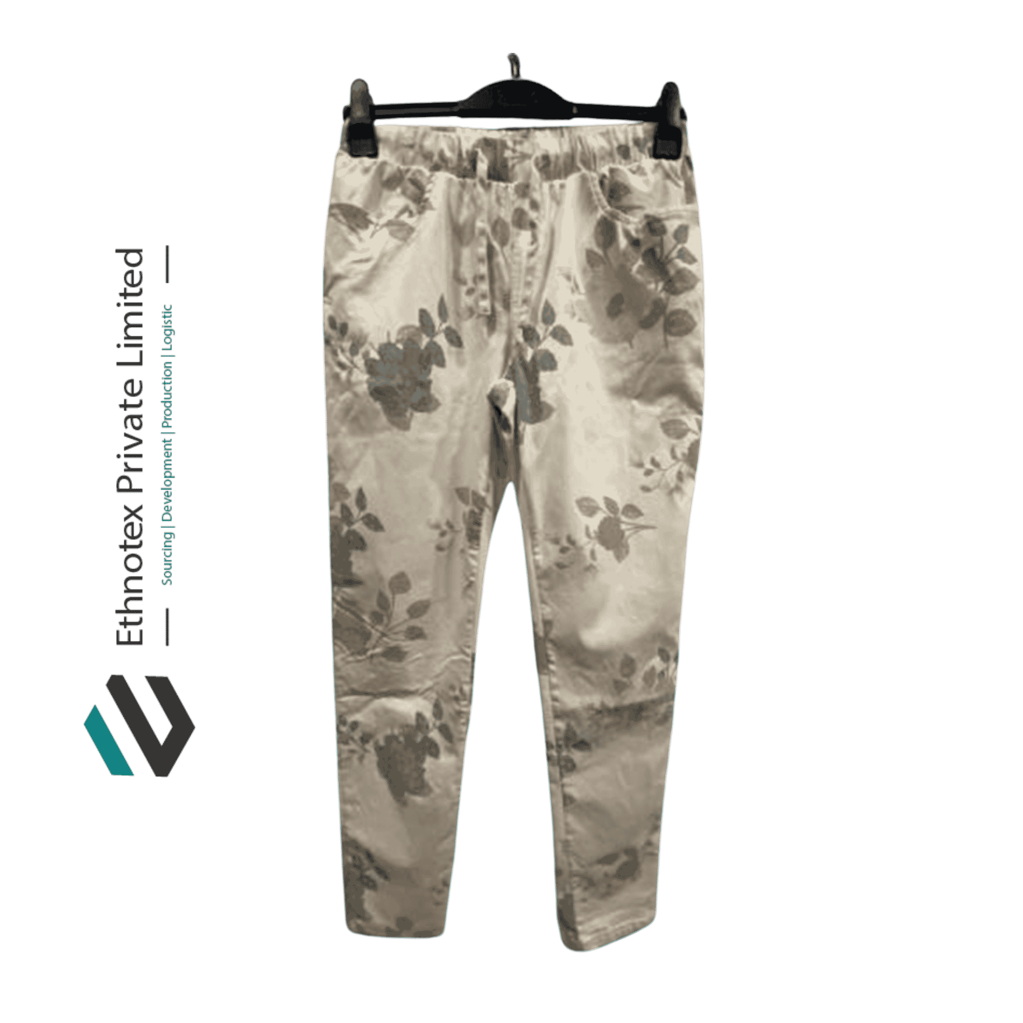 A pair of light-colored pants with a floral pattern, hanging on a black hanger. The pants have an elastic waistband and are made of 85% cotton, 12% polyester, and 3% elastane, offering comfort and slight stretch.
